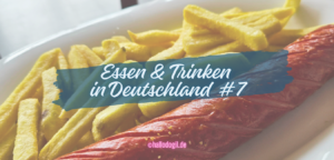 Banner für deutscher Imbiss einfach erklärt. Im Bild Pommes und Bratwurst